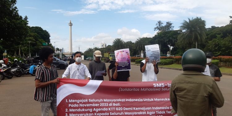 SMS-Indonesia: Lawan Provokator Pemecah Belah Bangsa Anti G20!